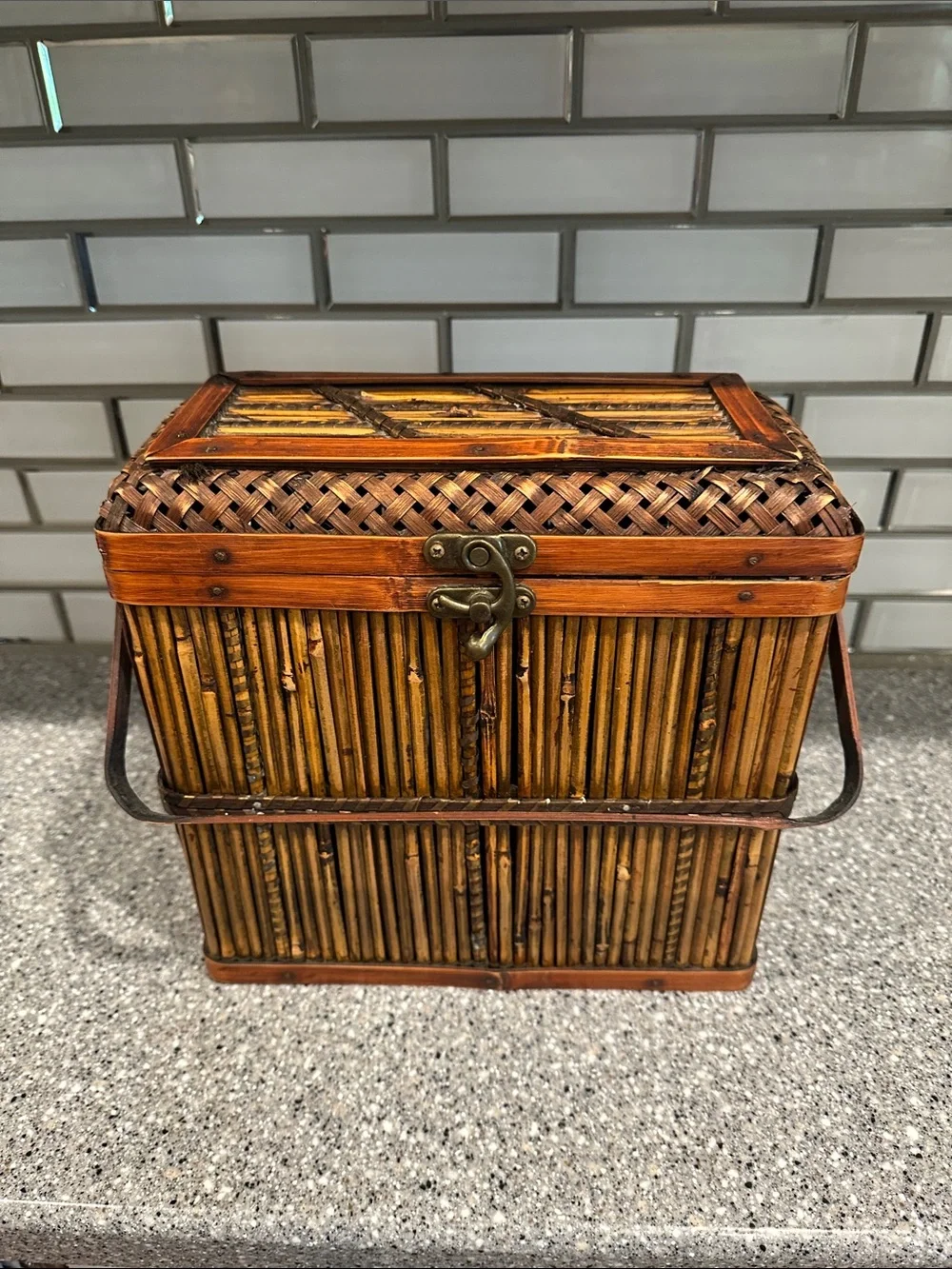 Woven bamboo storage box. All bamboo with metal latch closure.